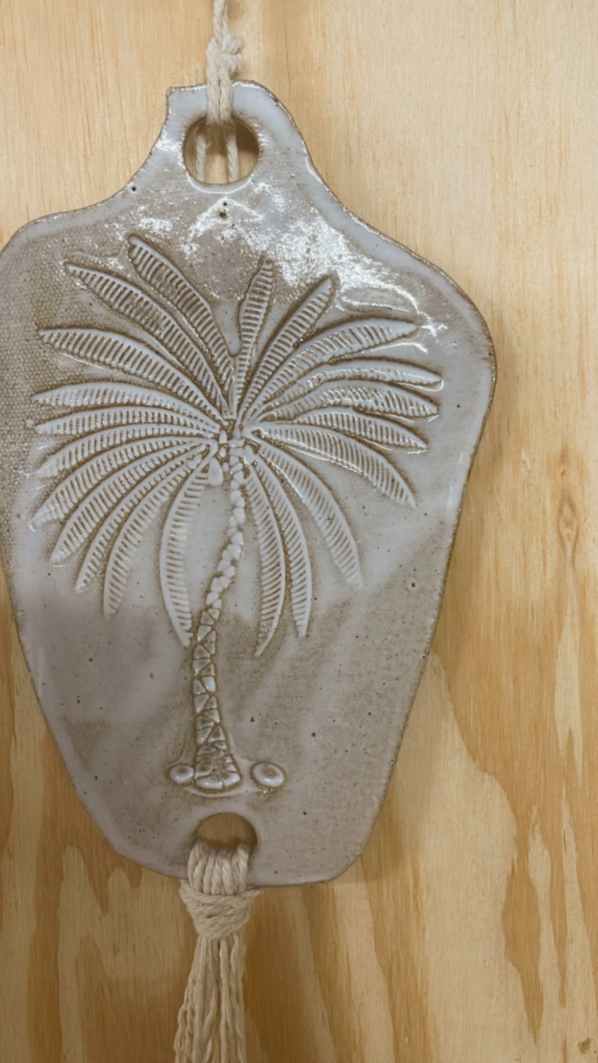 Ceramic palm wall hanging